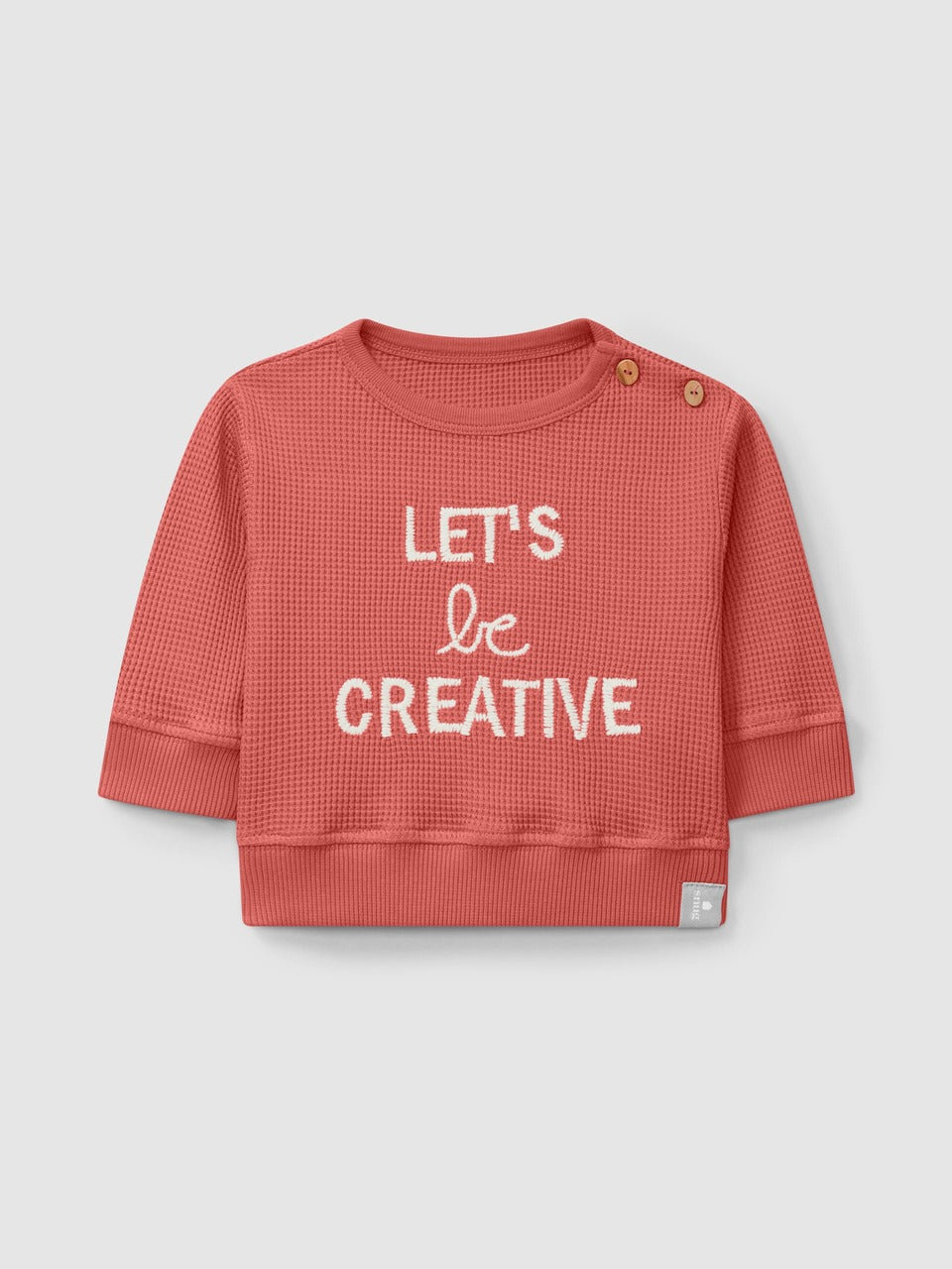 Sudadera ¨Seamos creativos¨ coral Snug